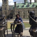 JA among Famous Five statues on Parliament Hill