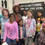 Jean with children at the JA Center